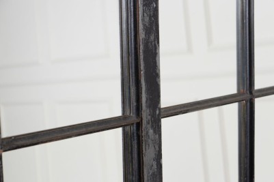 close up of cast iron mirrored window